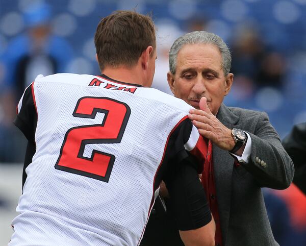 102515 NASHVILLE: -- Falcons owner Arthur Blank greets Matt Ryan as he prepares to play the Titans in a football game on Sunday, Oct. 25, 2015, in Nashville. Curtis Compton / ccompton@ajc.com