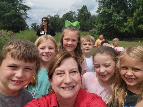 Census organizer Becky Griffin (center) is seen with students at West Fannin Elementary School. One goal of the census is to teach kids about the importance of pollinators. Courtesy of Becky Griffin