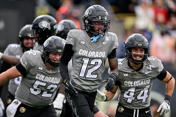 Colorado's Travis Hunter (12) celebrates after scoring a fourth-quarter touchdown against Utah at Folsom Field on Saturday, Nov. 16, 2024, in Boulder, Colorado. (Dustin Bradford/Getty Images/TNS)