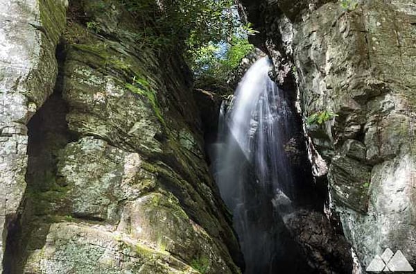 Raven Cliff Falls flows through a fracture in a 40-foot-tall cliff.