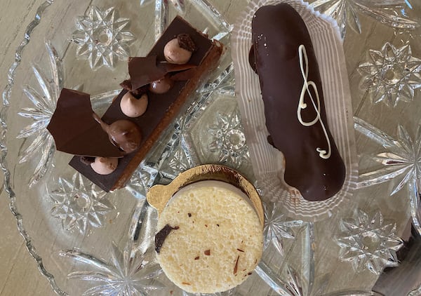 Alon’s offers such treats as shokolina (left top), an eclair (right top) and a tiramisu torte (bottom). (Bill King for The Atlanta Journal-Constitution)