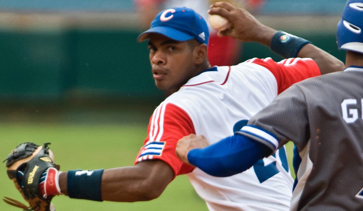 Hector Olivera will play third base for the Braves, likely as early as Monday at Turner Field.