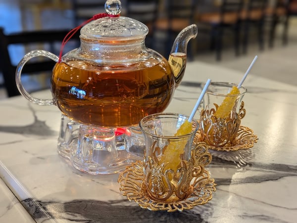 Rose Valley Sweets patrons can sip Persian rose tea from ornate cups. Other flavors include chrysanthemum, green and earl grey, with seasonal teas coming soon. (Courtesy of Paula Pontes)