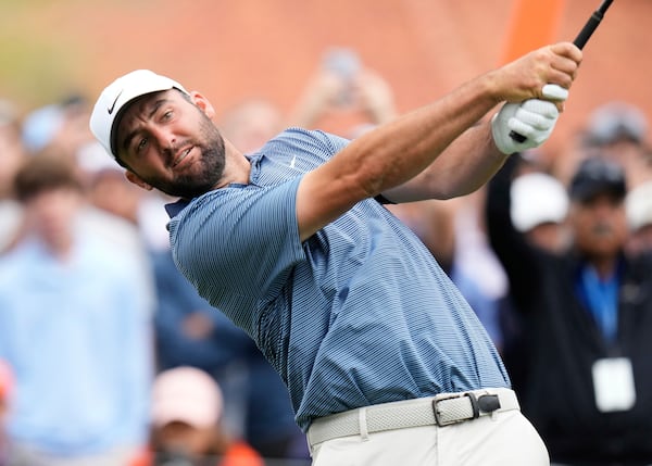 Scottie Scheffler hits from the sixth tee during the final round of The Players Championship golf tournament Sunday, March 16, 2025, in Ponte Vedra Beach, Fla. (AP Photo/Chris O'Meara)