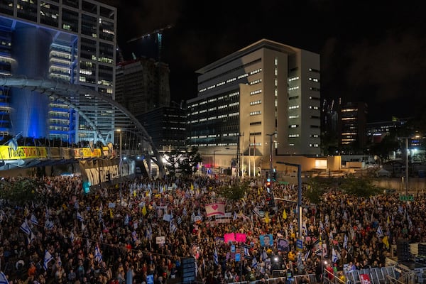 People take part in a protest in Tel Aviv, Israel, Saturday, March 8, 2025, demanding the immediate release of hostages held by Hamas in the Gaza Strip. (AP Photo/Ariel Schalit)