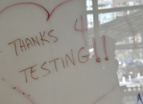 In this January file photo, Georgia Tech students and employees get   tested for COVID-19 at Georgia Tech’s Economic Development Building on Tuesday, January 4, 2022. (Hyosub Shin / Hyosub.Shin@ajc.com)