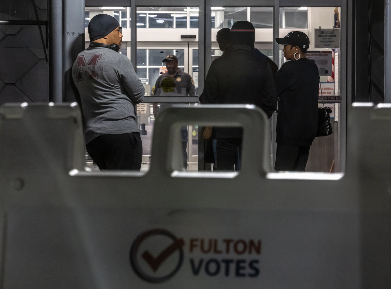 Voters enter the polls at the Buckhead Library located in Atlanta on Friday, Nov. 1, 2024, on the last day of early voting in Georgia.  (John Spink/AJC)