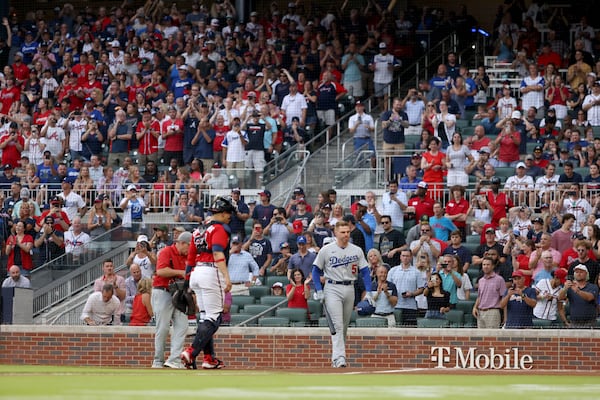  Los Angeles Dodgers first baseman Freddie Freeman reacts to the crowd as Atlanta Braves fans give Freeman a standing ovation before Freeman’s first at bat. (Jason Getz / Jason.Getz@ajc.com)