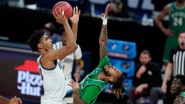 Villanova's Jermaine Samuels (23) shoots over North Texas' James Reese (0) during the first half of their second-round NCAA Tournament game Sunday, March 21, 2021, at Bankers Life Fieldhouse in Indianapolis. (Darron Cummings/AP)