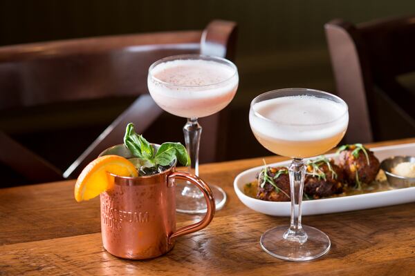 City Tap cocktails (from left to right) Seasonal Mule, Peaches and Cream, and Midnight Train. Photo credit- Mia Yakel.