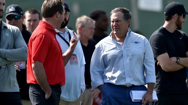 March 16, 2106 Athens, GA: Georgia head coach Kirby Smart, left chats with New England Patriots head coach Bill Belichick during  Pro Day at the University of Georgia Wednesday March 16, 2016.  Players,  who have wrapped up their college careers,  participated in a set of predetermined skills designed to test their strength, speed and agility in hopes of impressing NFL scouts.     BRANT SANDERLIN/BSANDERLIN@AJC.COM