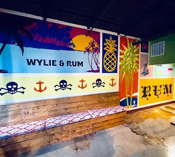 Murals add pops of color to the interior of Wylie & Rum.