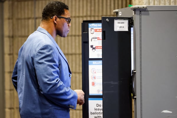 Republican U.S. Senate candidate Herschel Walker casts his ballot at Sutton Middle School on Tuesday, May 24, 2022. (Natrice Miller / natrice.miller@ajc.com)