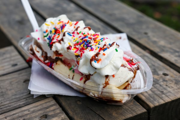 The banana split served at the Frosty Caboose is a classic sundae with vanilla, chocolate and strawberry ice cream, and a fresh banana covered with hot fudge, marshmallow cream, strawberry topping, whipped cream, sprinkles and a cherry. (Jason Getz/jason.getz@ajc.com)
