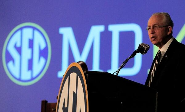 Southeastern Conference (SEC) Commissioner Mike Slive speaks during SEC media days on Monday, July 14, 2014, in Hoover, Ala. (AP Photo/Butch Dill) Mike Slive throws out the first pitch. (Butch Dill/AP)