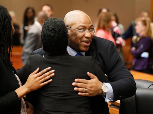 4/23/18 - Atlanta - Chief Assistant District Attorney Clint Rucker is congratulated after the verdict.  The jury found Tex McIver guilty on four of five charges on their fifth day of deliberations today at the Tex McIver murder trial at the Fulton County Courthouse.   Bob Andres bandres@ajc.com