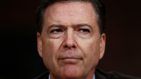 In this Wednesday, May 3, 2017, photo, then-FBI Director James Comey pauses as he testifies on Capitol Hill in Washington, before a Senate Judiciary Committee hearing. President Donald Trump abruptly fired Comey on May 9, ousting the nation's top law enforcement official in the midst of an investigation into whether Trump's campaign had ties to Russia's election meddling.(AP Photo/Carolyn Kaster)