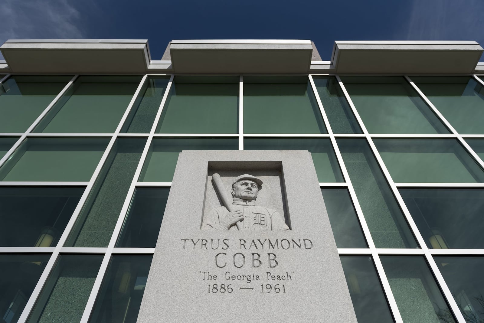 A monument to Ty Cobb stands outside the Royston Public Library. Cobb has always been held up as a symbol of success in his hometown, and his supporters point to good deeds that followed his baseball career, including providing endowments for medical care and education in Georgia. (DAVID BARNES / SPECIAL)