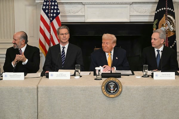 Secretary of Commerce Howard Lutnick, from left, Treasury Secretary Scott Bessent, President Donald Trump and White House AI and crypto czar David Sacks attend the White House Crypto Summit in Washington, Friday, March 7, 2025. (Pool via AP)