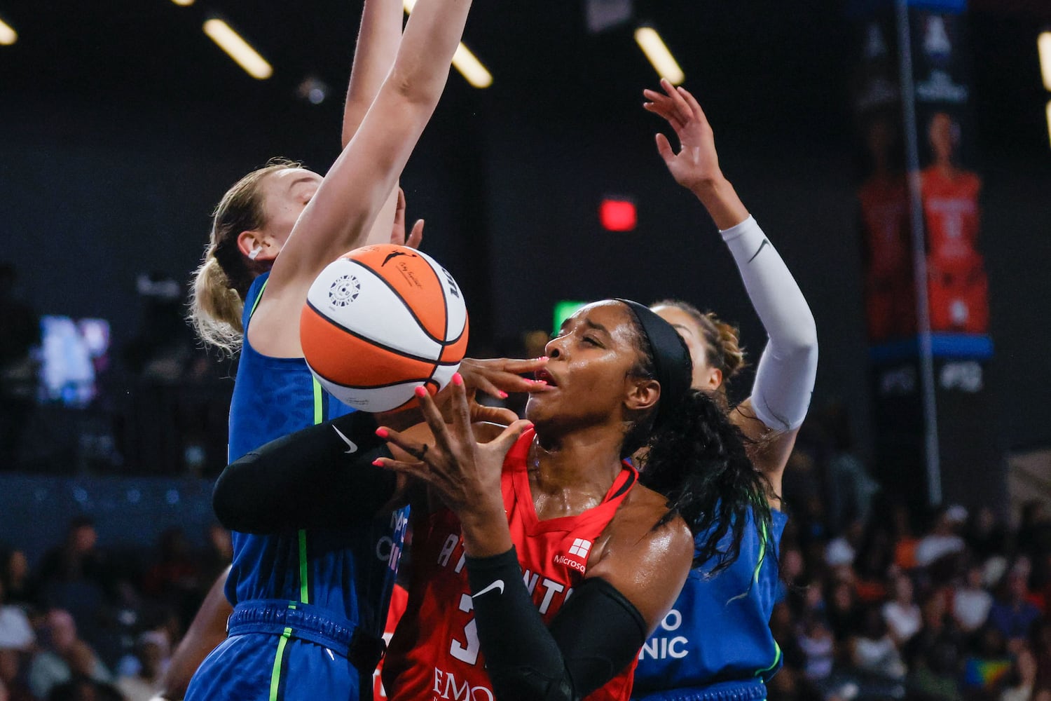 Atlanta Dream forward Cheyenne Parker-Tyus  attempts a shot under pressure from Minnesota players during the first half at Gateway Center Arena, Sunday, May 26, 2024, in Atlanta.
(Miguel Martinez / AJC)