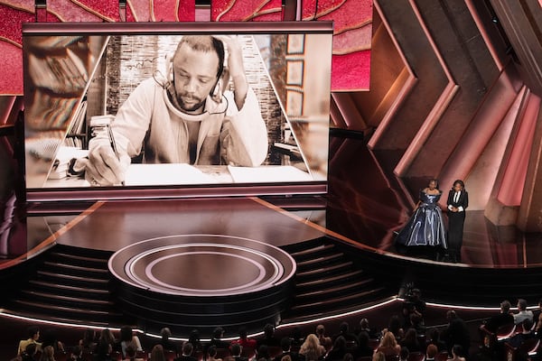 Whoopi Goldberg, left, and Oprah pay tribute to Quincy Jones during the Oscars on Sunday, March 2, 2025, at the Dolby Theatre in Los Angeles. (AP Photo/Chris Pizzello)