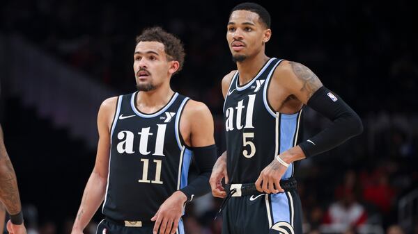 Guards Trae Young (11) and Dejounte Murray (5) were the Hawks' stars but Murray has been traded. (Jason Getz / jason.getz@ajc.com)