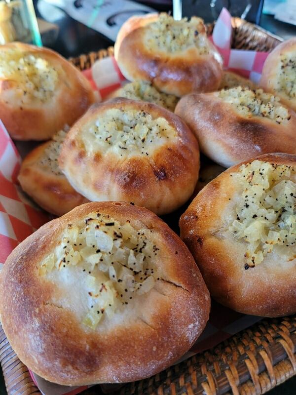 Besides bagels, Bronx Bagel Buggy sells bialys, a traditional Polish roll that’s softer than a bagel and with an onion filling. / Courtesy of Julie Dragich.