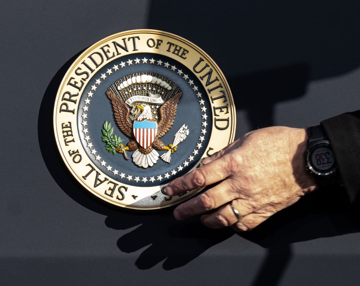 220111-Atlanta-The presidential seal is placed on the podium before President Joe Biden and Vice President Kamala Harris spoke about voting rights during at Clark Atlanta University on Tuesday, Jan. 11, 2022.  Ben Gray for the Atlanta Journal-Constitution