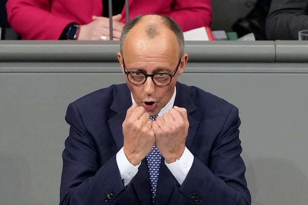 Opposition leader Friedrich Merz of CDU speaks during a plenary session at the German parliament Bundestag where he faces a vote of confidence, Berlin, Germany, Monday, Dec. 16, 2024. (AP Photo/Markus Schreiber)