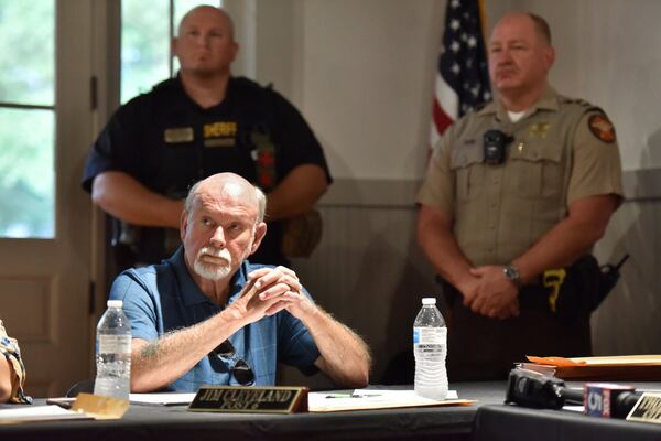 Councilman Jim Cleveland reacts during public hearing and regular meeting at Hoschton Train Depot in Hoschton on Thursday, May 30, 2019. He and Mayor Theresa Kenerly will face voters in a recall election Jan. 14. HYOSUB SHIN / HSHIN@AJC.COM