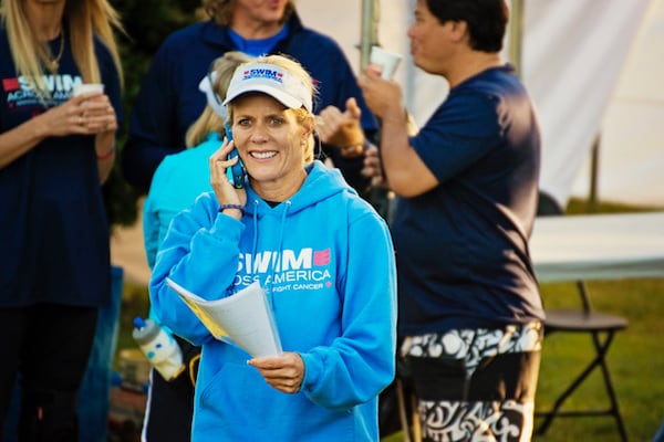 Sheri Hart, who helped found Swim Across America Atlanta, is pictured at a previous open water swim event held here. Courtesy of Swim Across America