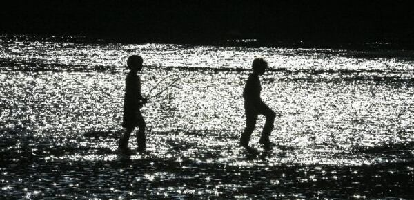 October 31, 2016 Cobb County: Harris Young-8 (left) and friend, Preston Shaver-7 (right) trudged along through the river at the Chattahoochee River at the Paces Mill Palisades Unit of the Chattahoochee River National Recreation Area in Cobb County on Monday, Oct. 31, 2016 looking for just about anything to catch. The pair were off school and were enjoying the summer like temperatures on Halloween. Channel 2 Action News meteorologist Karen Minton said Atlanta temperatures have already increased above the average high for this time of year, 69 degrees. And on the heels of temperatures that soared to a record-breaking 86 Sunday, temps were forecast to reach a high of 85 by 4 p.m. Monday and possibly break the record high of 85 set in 1961, Channel 2 reported. JOHN SPINK /JSPINK@AJC.COM