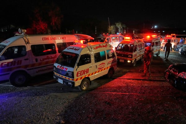 Ambulances carrying wounded survivors rescued by security forces from a passenger train attacked by insurgents leave a railway station in Much, Pakistan's southwestern Balochistan province, Wednesday, March 12, 2025. (AP Photo/Anjum Naveed)