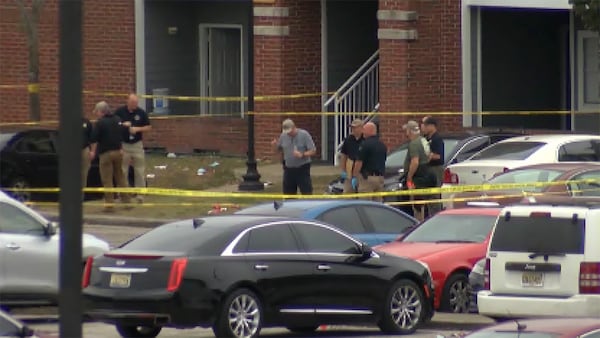 This image taken from video provided by WSFA shows law enforcement working at the scene of a shooting at Tuskegee University, Sunday, Nov. 10, 2024, in Tuskegee, Ala. (WSFA via AP)