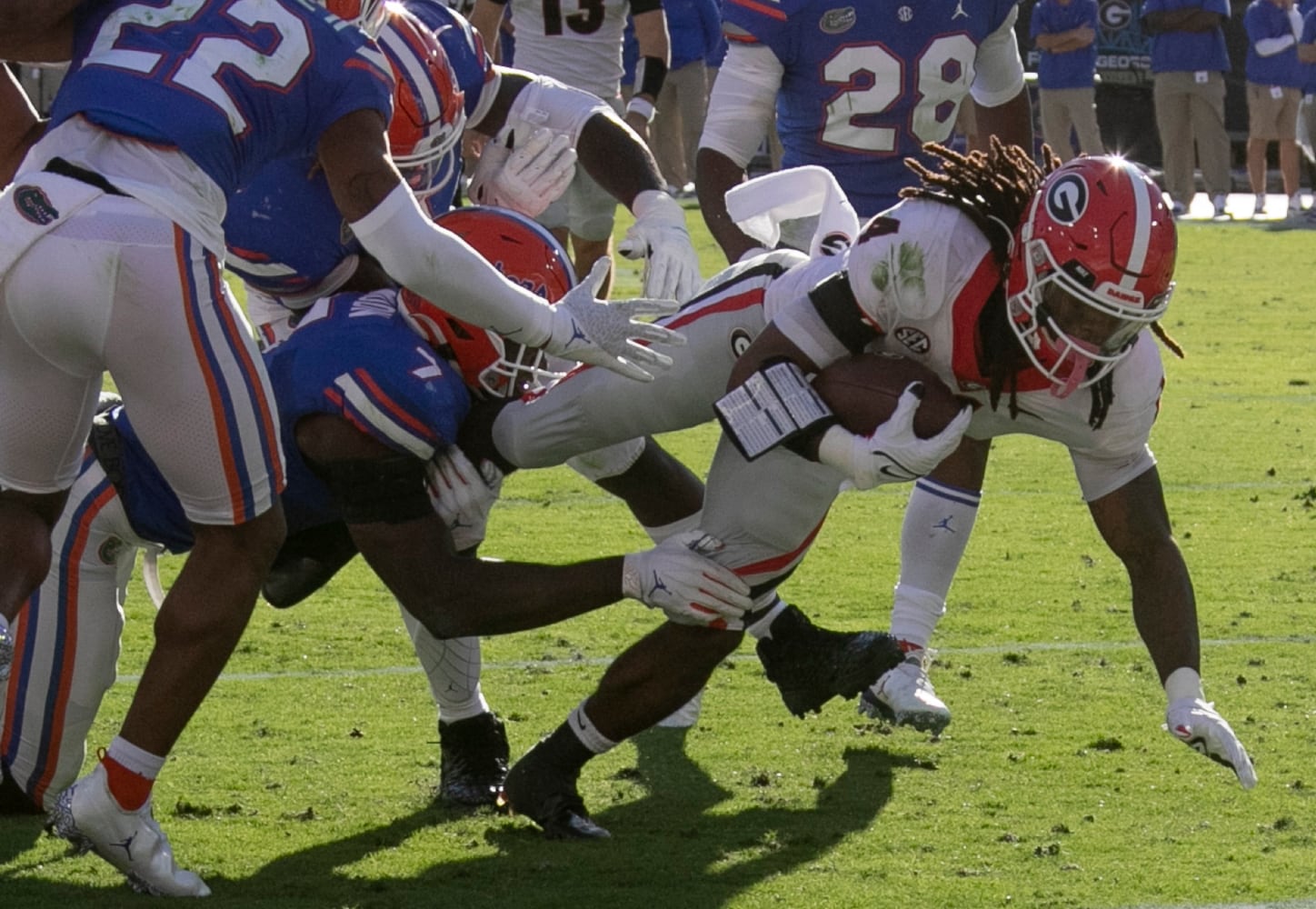 10/30/21 - Jacksonville -  Georgia Bulldogs running back James Cook (4) scored Georgia's first touchdown during the first half of the annual NCCA  Georgia vs Florida game at TIAA Bank Field in Jacksonville.   Bob Andres / bandres@ajc.com