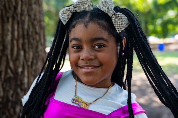 Zoey Fierce poses for a picture before her dance performance at the Pure Heat Community Festival in Piedmont Park on Sunday, Sept. 1, 2024.  (Olivia Bowdoin for the AJC).