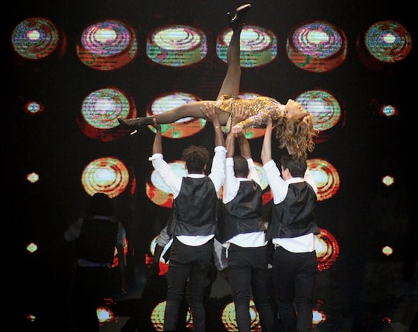  Paula Abdul gets a lift from her dancers. Photo: Melissa Ruggieri/AJC