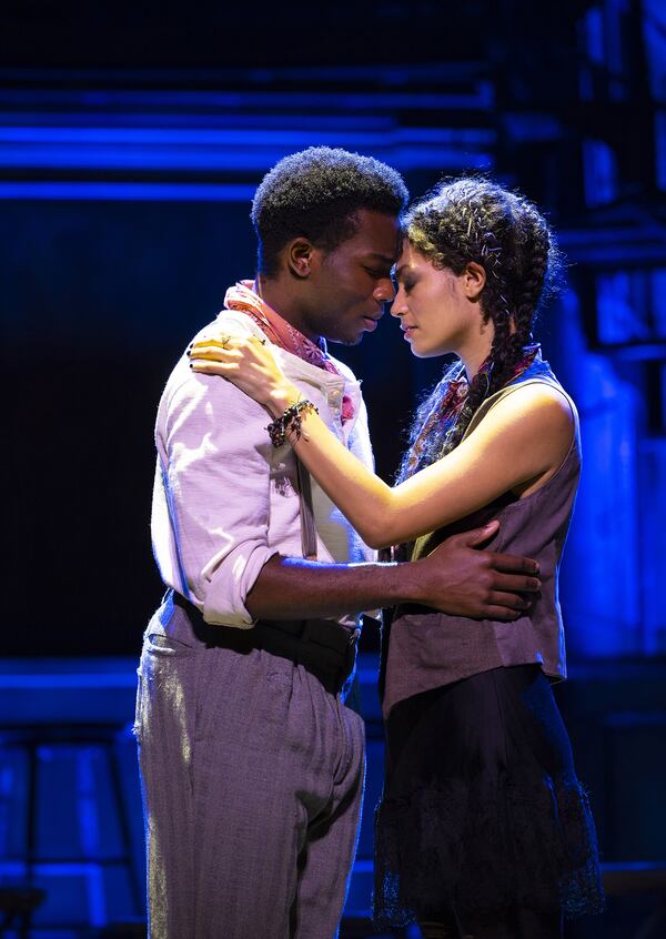 Chibueze Ihuoma and Hannah Whitley play lovers Orpheus and Eurydice in the national tour of Broadway’s “Hadestown.” The role of Eurydice was played by Courtney Lauster at Tuesday's performance. The show is at the Fox Theatre through Sunday. 
(Courtesy of T. Charles Erickson)