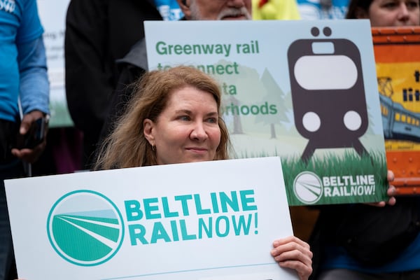 Advocates for Beltline rail, including Beverly Miller, who is on the board of Beltline Rail Now!, rally on the steps of Atlanta City Hall on Friday, March 22, 2024.   (Ben Gray / Ben@BenGray.com)