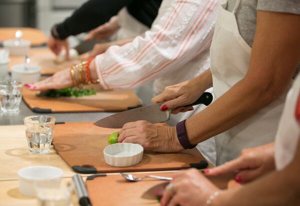 Students learn techniques at Sur La Table in Alpharetta.