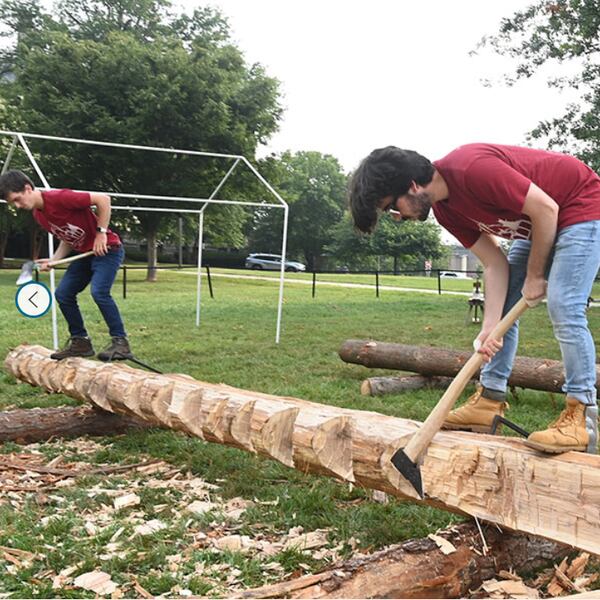 Handshouse Studio volunteers hewed the timbers for the truss with traditional tools, inluding hand axes, and assembled the replica with wooden pegs. Photos: Handshouse Studio