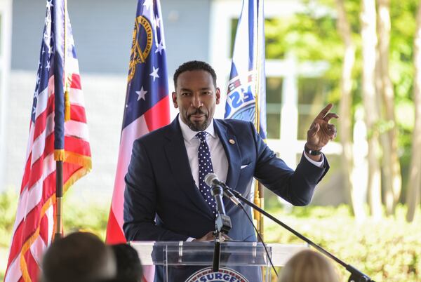 Mayor Andre Dickens speaks at the ribbon cutting ceremony for The Villages of East Lake grand reopening on Monday, May 9, 2022. (Natrice Miller / natrice.miller@ajc.com)