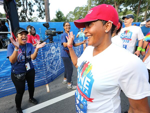 Mayor Keisha Lance Bottoms heads toward the finish line at the AJC Peachtree Road Race