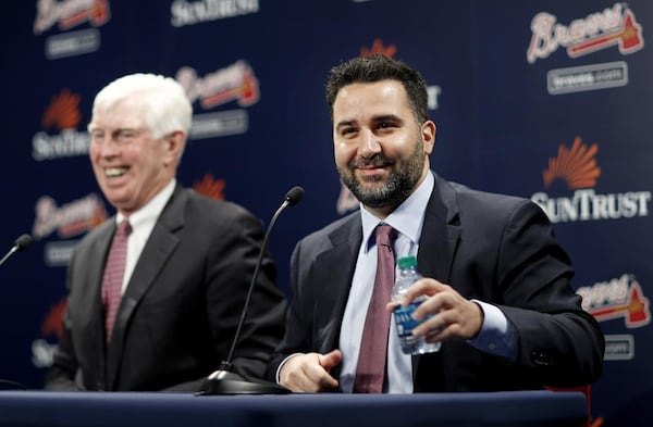  Alex Anthopoulos (right) was introduced as the Braves' new general manager on Monday by team CEO Terry McGuirk (left). (AP photo)