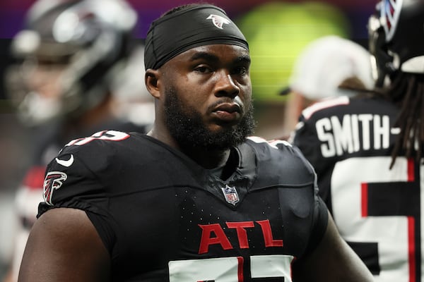 Atlanta Falcons defensive end Grady Jarrett warms-up before their game against the Jacksonville Jaguars in their preseason NFL football game at Mercedes-Benz Stadium, on Friday, Aug. 23, 2024, in Atlanta. (Jason Getz / AJC)
