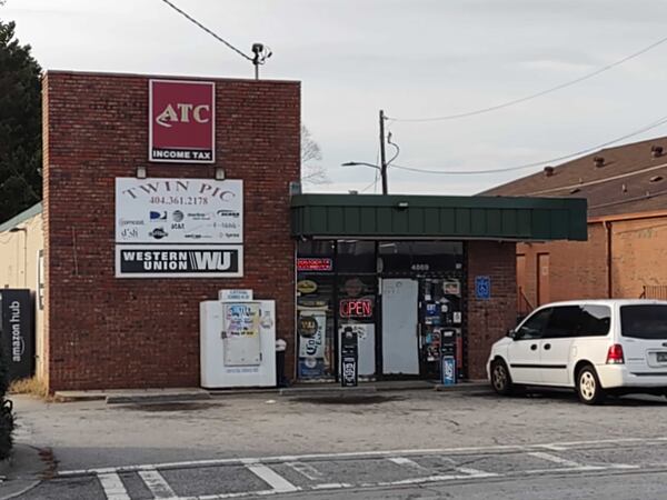 Two people were shot at ATC Income Tax in Forest Park, but business had largely returned to normal by about 4:30 p.m. Friday.