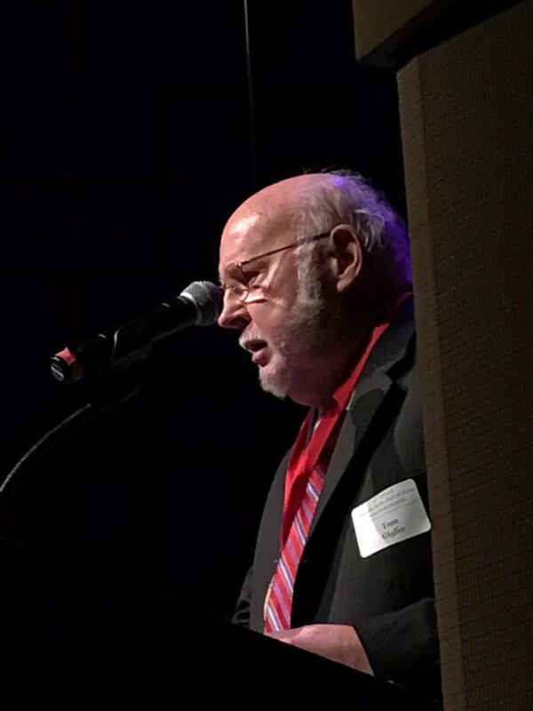  Radio engineer Tom Giglio accepting his medal representing his Georgia Radio Hall of Fame induction. CREDIT: Rodney Ho/rho@ajc.com