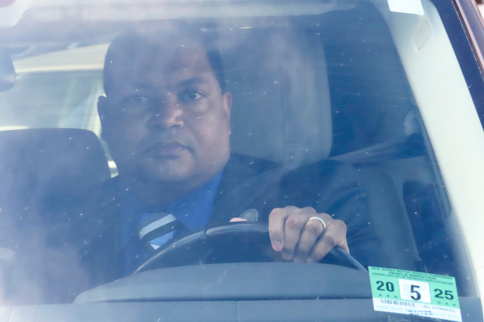 Atlantic City Mayor Marty Small Sr. drives away from the courthouse after a court appearance on charges he and his wife La'Quetta Small, the city's superintendent of schools, beat and abused their teenage daughter, in Mays Landing, N.J., Thursday, Oct. 10, 2024. (AP Photo/Wayne Parry)