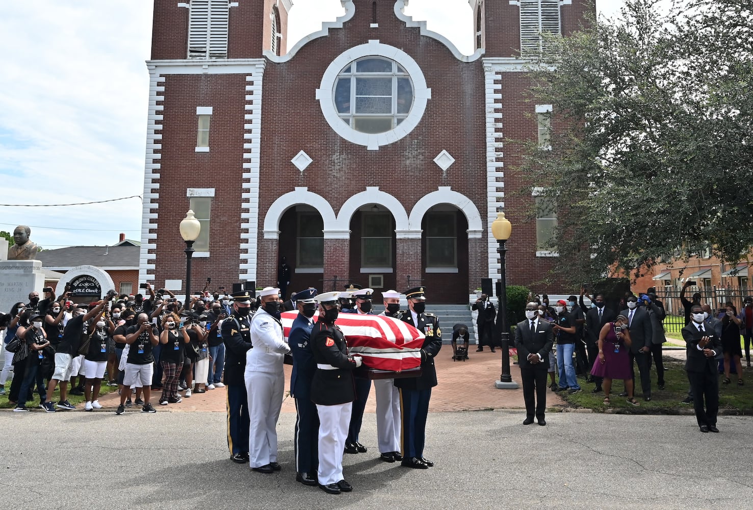 John Lewis crosses Edmund Pettus Bridge for final time