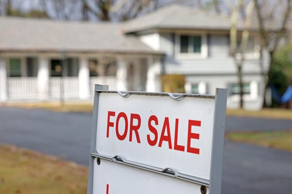 A single family style home is shown for sale, Wednesday, December 7, 2022, in Dunwoody, Ga. (Jason Getz / Jason.Getz@ajc.com)